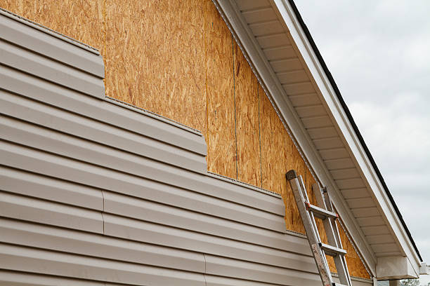 Professional Siding Contractor technician working in Phoenix, NY